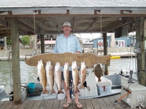 Good Catch of Reds and a Flounder